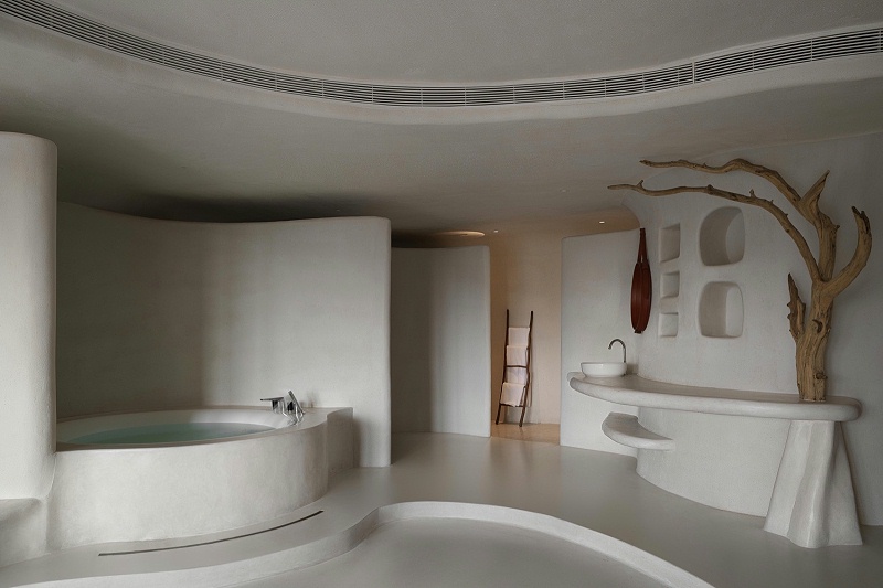 亿伽设计-汤泉设计-崖壁泳池度假酒店：原始洞穴体验的空间转译