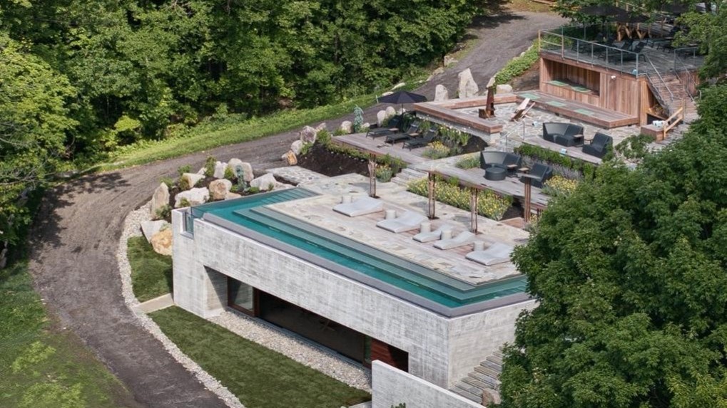 亿伽设计-汤泉设计-魁北克温泉馆：自然怀抱中的水疗中心